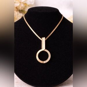 Vintage Sarah Coventry Gold Tone Rhinestone Circle Pendant Necklace 10” Drop